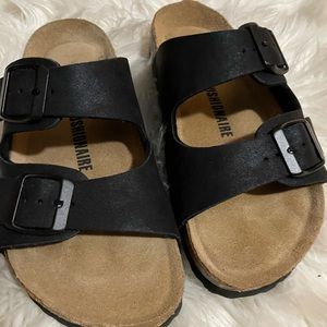 Cushionaire sandals. Better than Birks. Very comfortable.